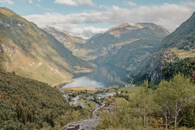A Journey of Majestic Fjords, Soaring Waterfalls, & Timeless European Charm