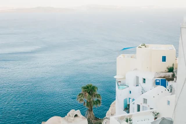 A Journey Through Ionian Beauty and Santorini Skies