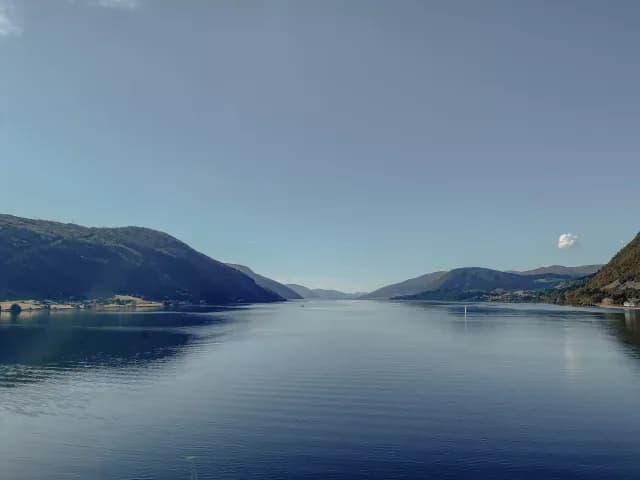 A Journey of Narrow Waterways & Mountain Views