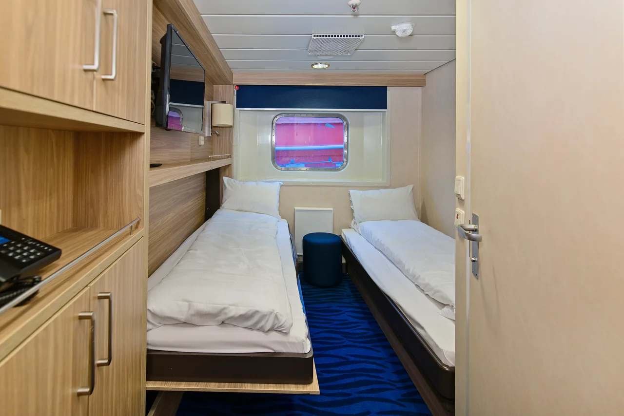 Twin on upper or promenade deck with window (restricted view)