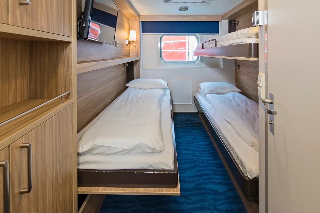 Triple on upper deck with window (restricted view)