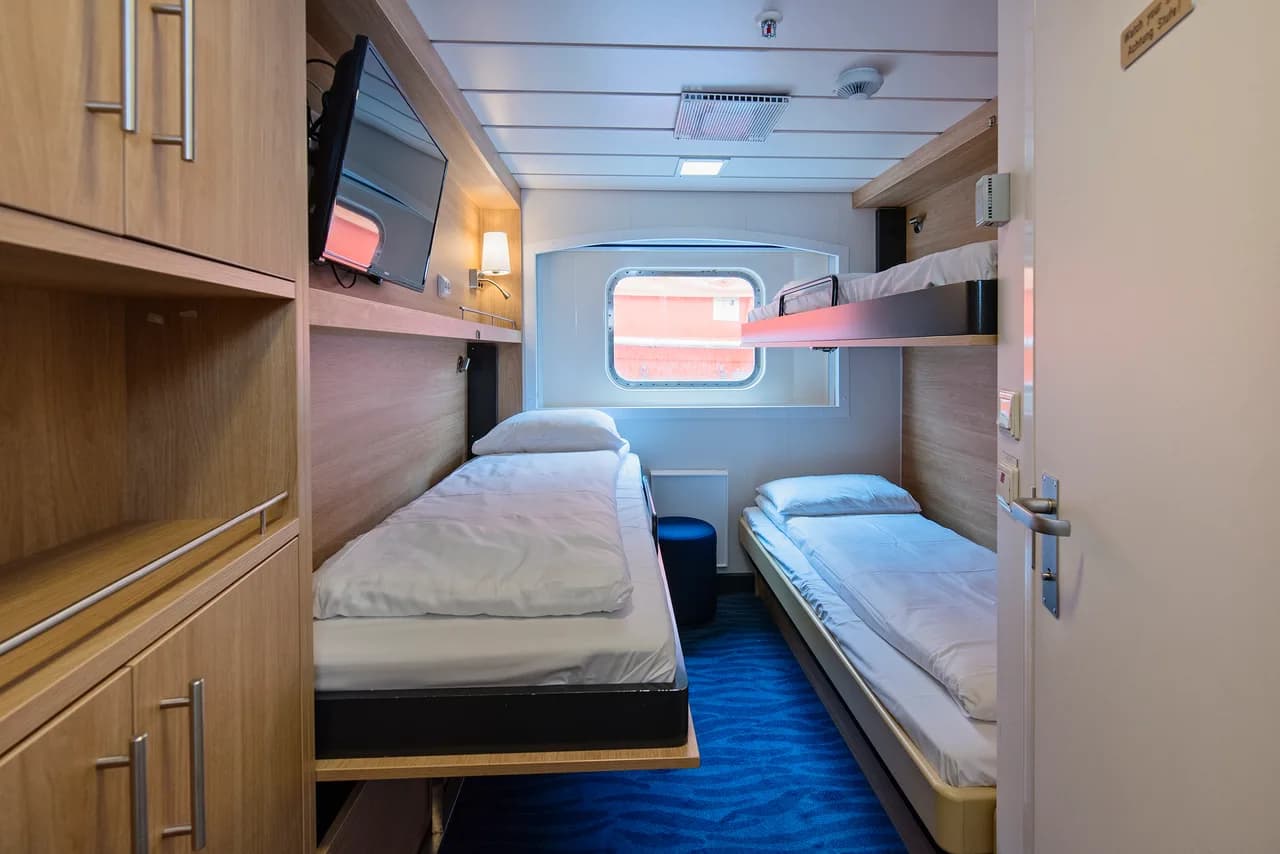 Triple on upper or middle deck with window (restricted view)