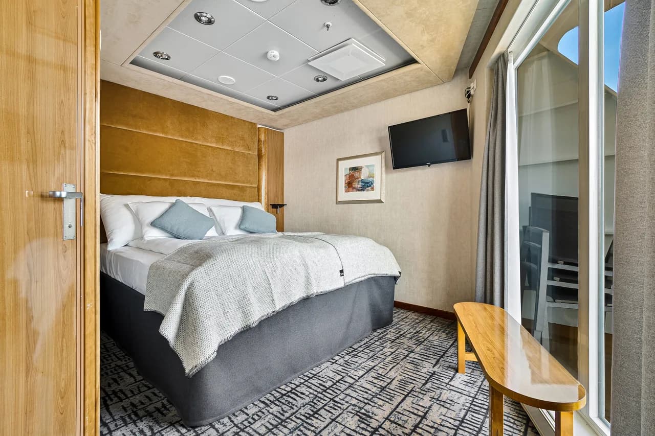 Owners' Suite on upper deck with balcony