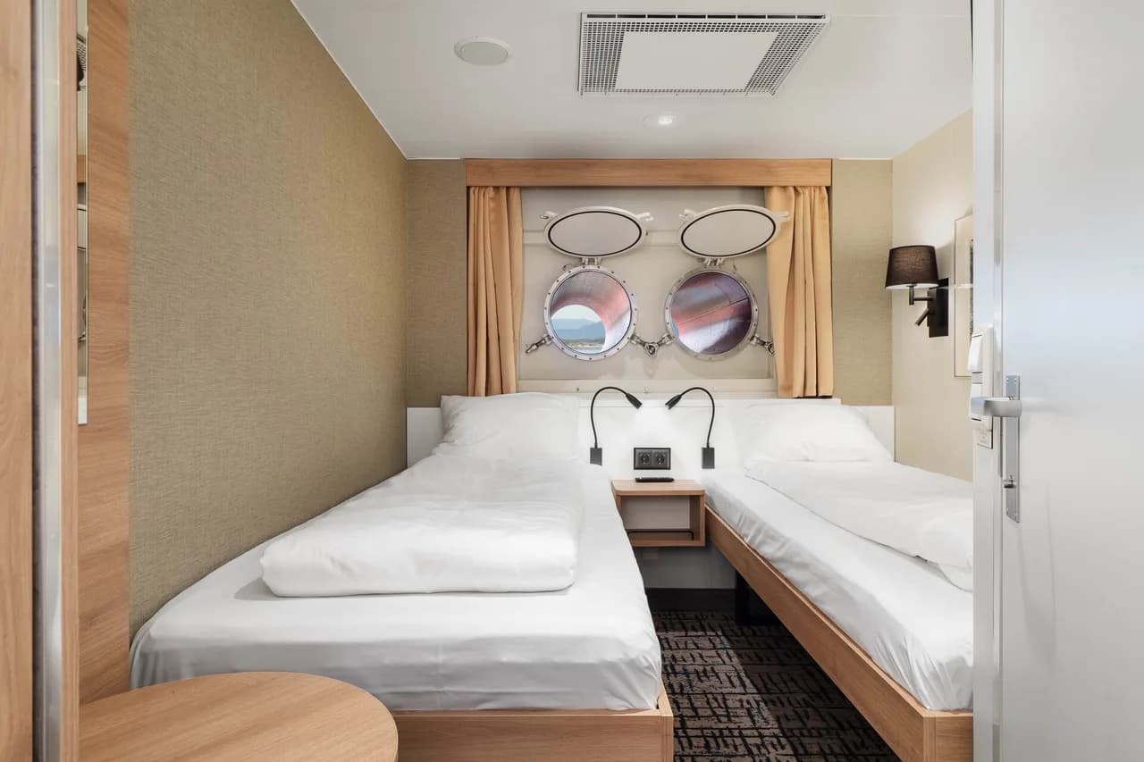 Twin on lower deck with porthole