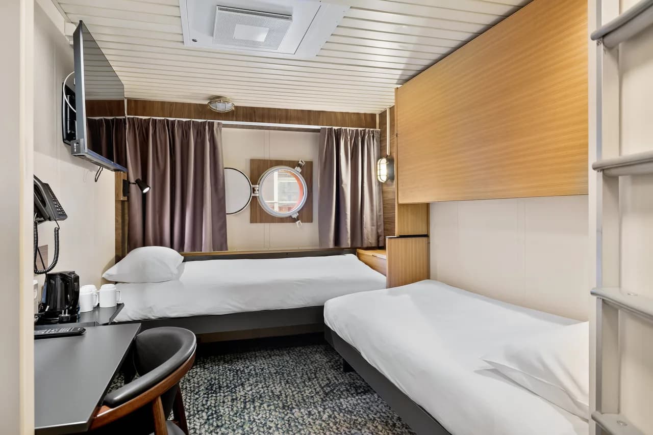 Triple on lower deck with porthole