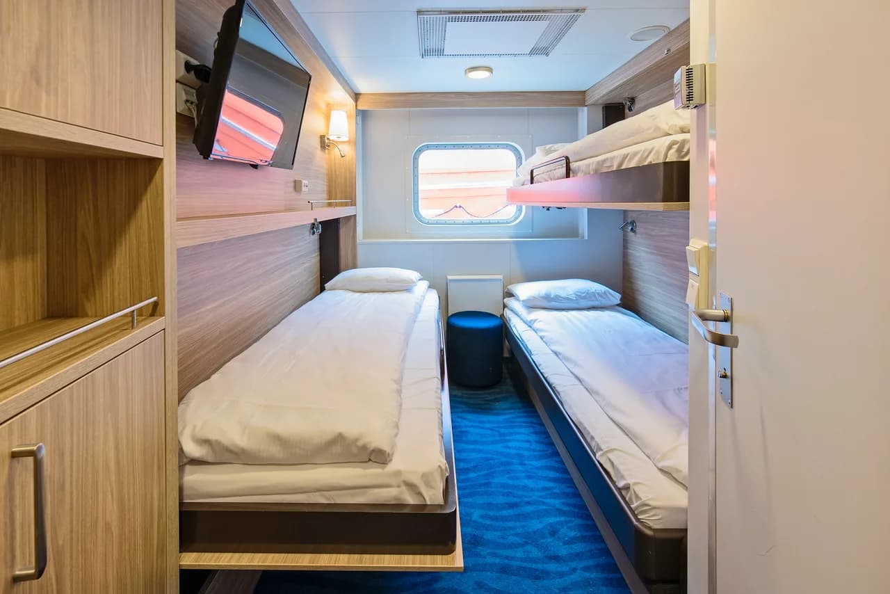 Triple on upper deck with window (restricted view)
