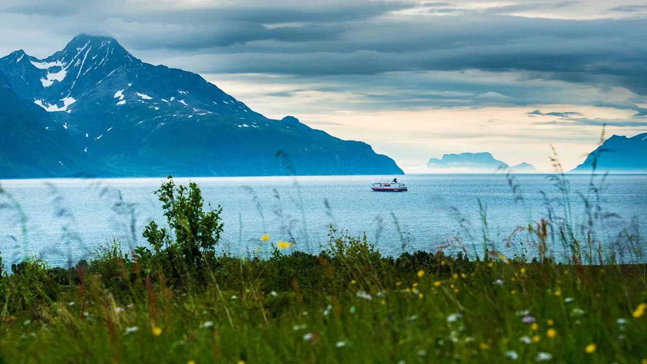 MS Nordnorge sailing through the Lyngenfjord