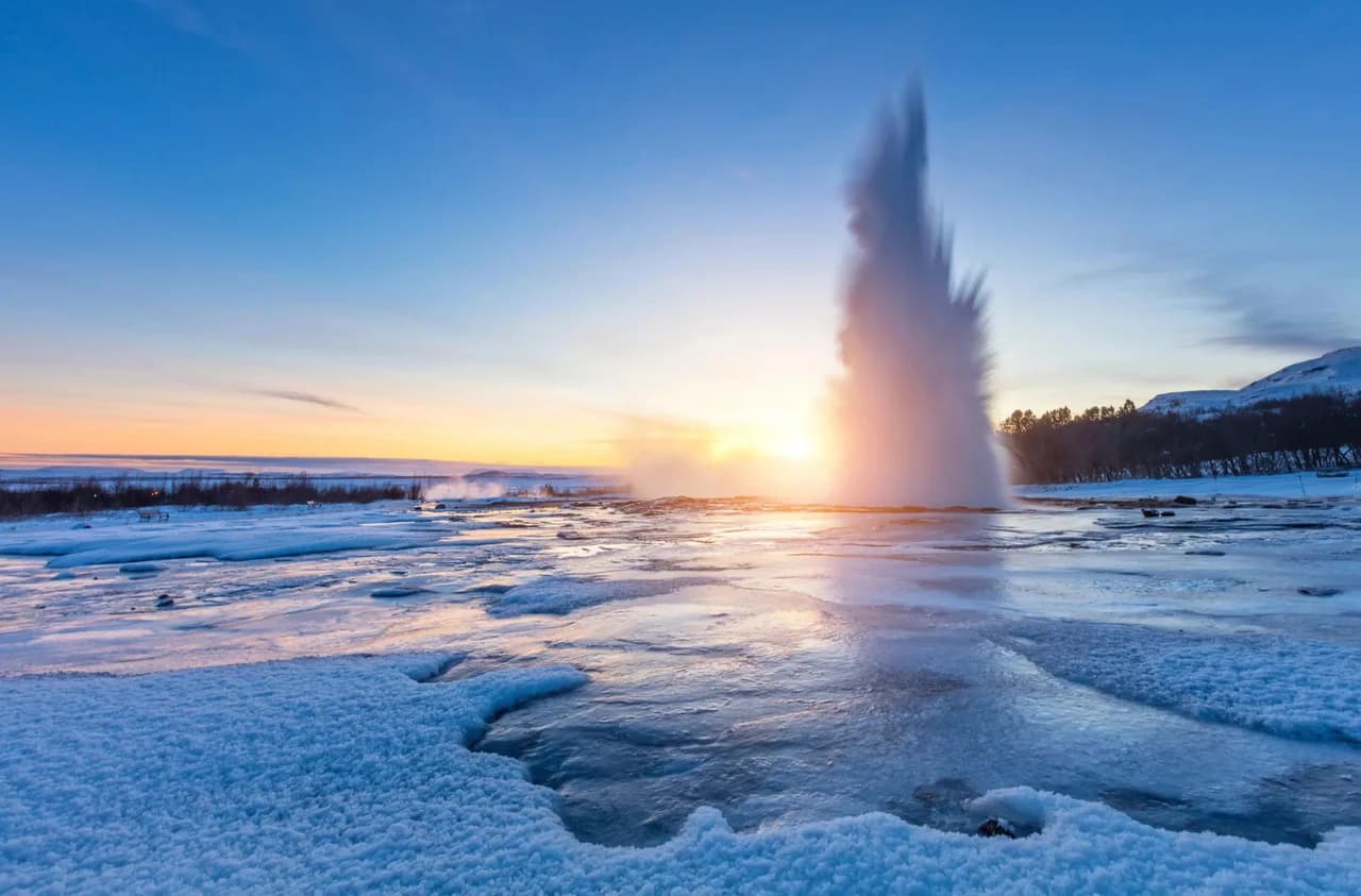 The powerful eruption of Strokkur, a highly active fountain geyser located in the Geysir Geothermal Area in southwest Iceland.