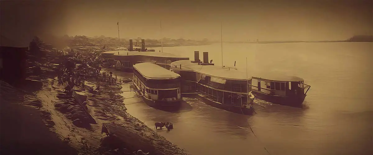 Historic Irrawaddy Flotilla Company steamers on the river in Burma
