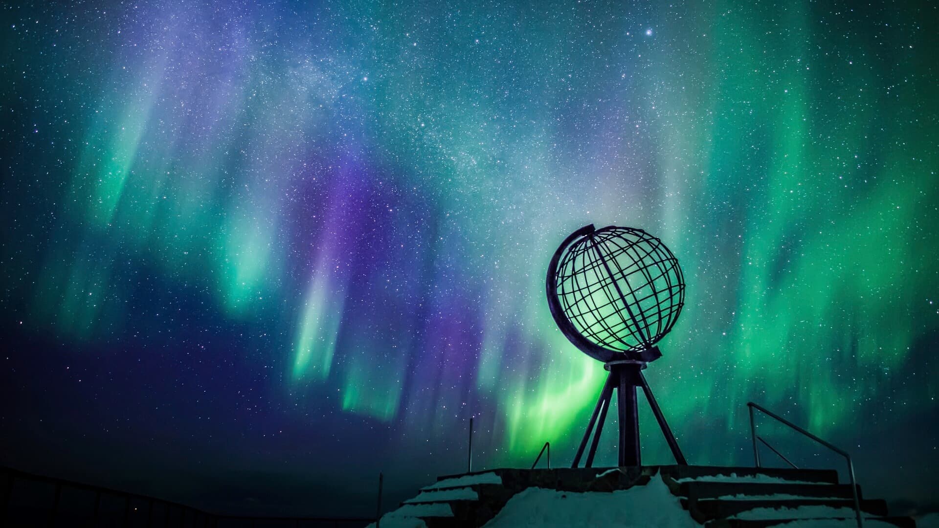 The Northern Lights shining above