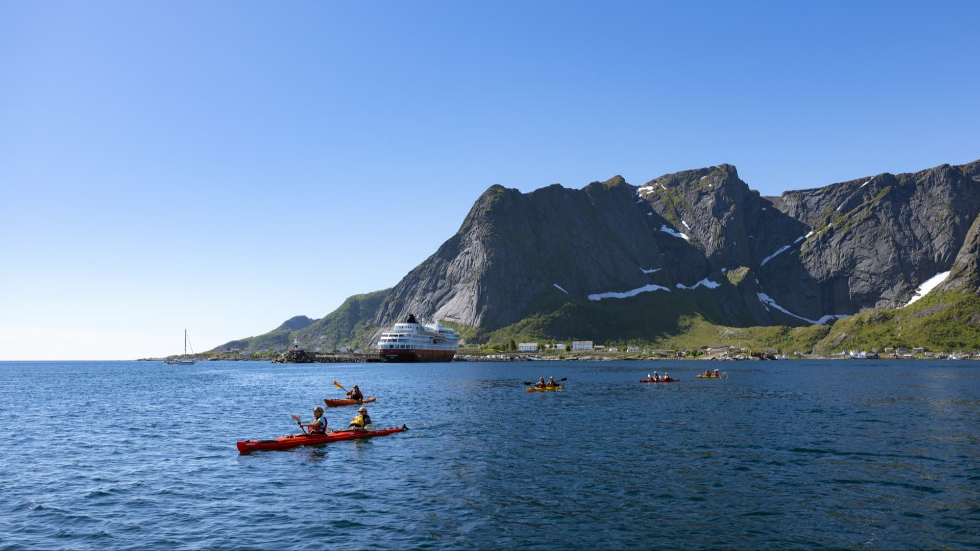 Opt to join a kayaking excursion from Reine to enjoy the best of the Lofoten Islands